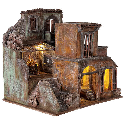 Illuminated village nativity with stable 40x45x35 cm for 10 cm figures 4