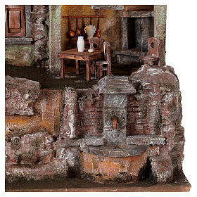 Dorfkrippe beleuchtet mit Tisch, Stuhl und Brunnen, 50x45x35 cm