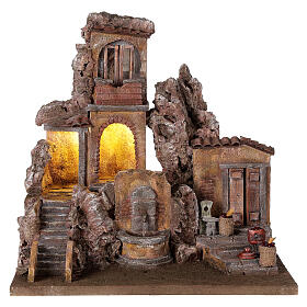Illuminated village with fountain and fruit baskets 40x5x35 for statues 10 cm