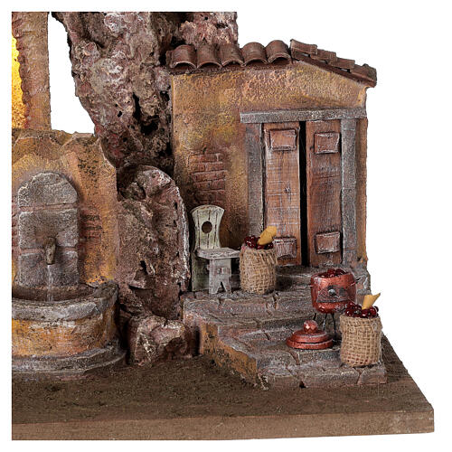 Illuminated village with fountain and fruit baskets 40x50x35 for statues 10 cm 4