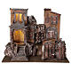 Illuminated village with laundry 50x60x40 for statues 12 cm s1