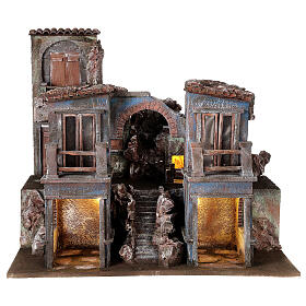 Lighted nativity village with archway and balconies 55x60x45 cm for 12 cm figures
