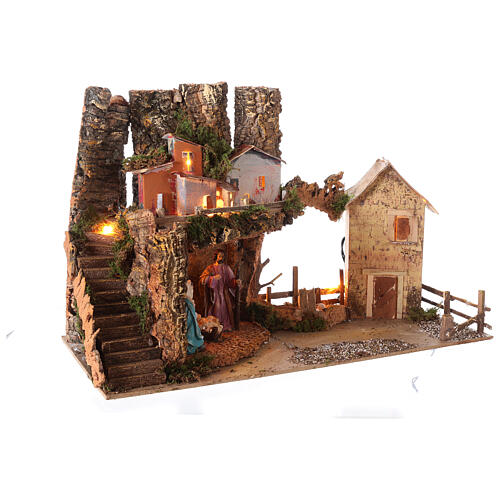 Nativity village 50x25x35 cm with lights and Holy Family 10 cm 4