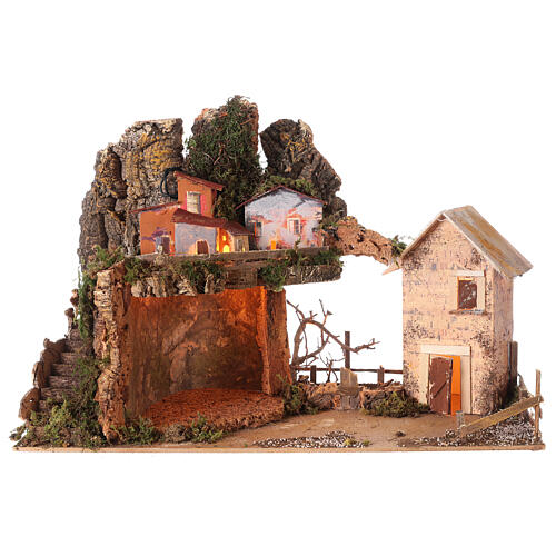 Nativity village 50x25x35 cm with lights and Holy Family 10 cm 5