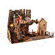 Nativity village 50x25x35 cm with lights and Holy Family 10 cm s4