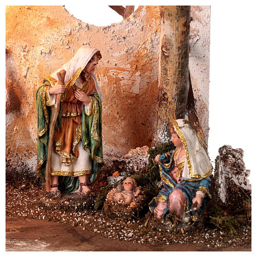 Nativity Scene stable with Holy Family, lights and fire 50x25x35 cm characters of 16 cm 2