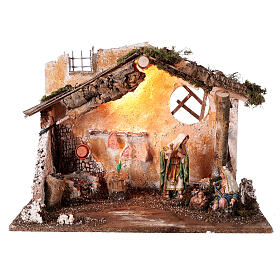 Cabane crèche avec Nativité 16 cm avec lumières et feu 50x25x35 cm