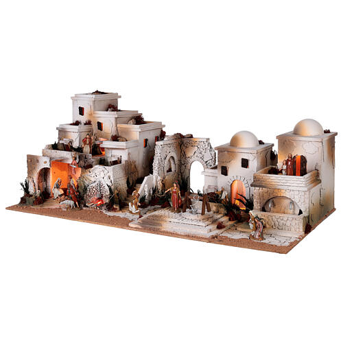 Palestinian Nativity Scene with fireplace, fountain and Moranduzzo's figurines of 10 cm 35x95x45 cm 2