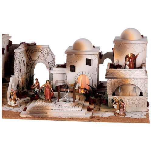 Palestinian Nativity Scene with fireplace, fountain and Moranduzzo's figurines of 10 cm 35x95x45 cm 5