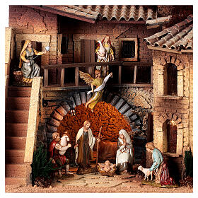 Nativity Scene village with octagonal house, well and 10 cm Moranduzzo characters 50x70x45 cm