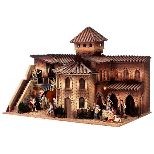 Nativity Scene village with octagonal house, well and 10 cm Moranduzzo characters 50x70x45 cm 3
