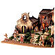 Nativity village with house, tower and church, Moranduzzo's characters of 8 cm, 50x70x45 cm s5