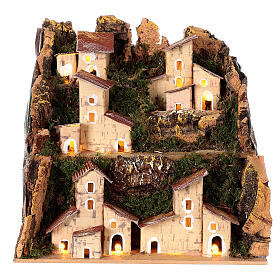 Aldeia com casinhas para presépio com figuras de 10-12 cm iluminada 20x20x15 cm