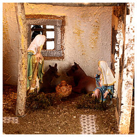 Cabaña para belén 16 cm Natividad cascada luces