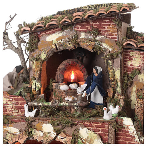 Nativity Scene with baker and shepherd, lights and mouvement, characters of 12 cm, 50x55x35 cm 3