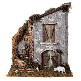 Casa com fontanário e ovelha 30x25x20 cm para presépio com figuras de 6-8 cm