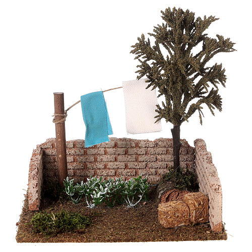 Garden setting with hanging clothes for 10 cm nativity 20x20x15cm 1