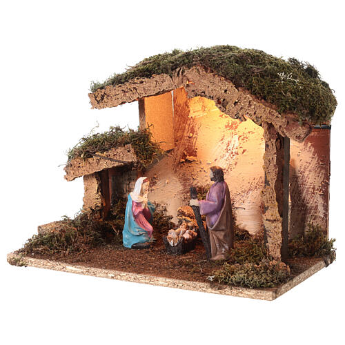 Illuminated Nativity stable with 10 cm characters 25x30x20 cm 2