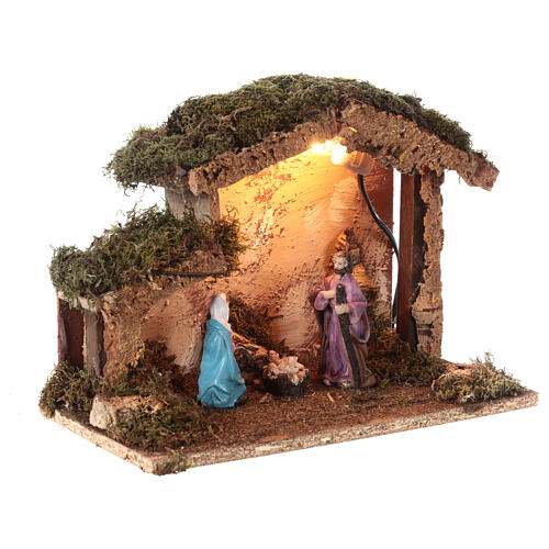 Illuminated Nativity stable with 10 cm characters 25x30x20 cm 3