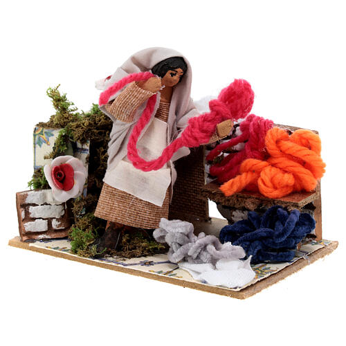 Wool seller animated nativity 8 cm 15x15x10 cm 3