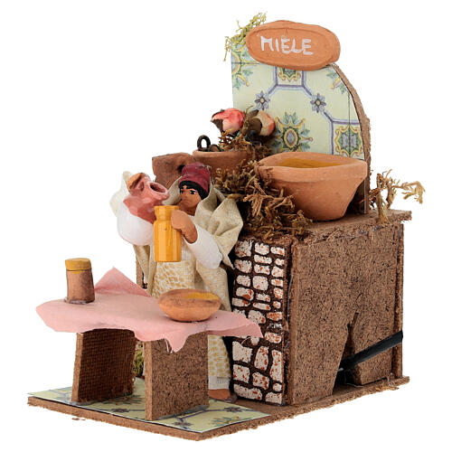 Venditrice di miele movimento presepe 8 cm 15x15x10 cm 2