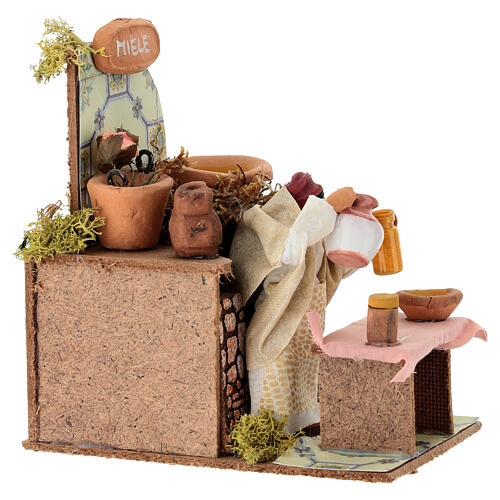 Honey seller animated nativity 8 cm 15x15x10 cm 3