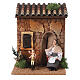 Woman embroidering and child on a rocking horse, animated Nativity Scene of 10 cm, 20x15x15 cm s1