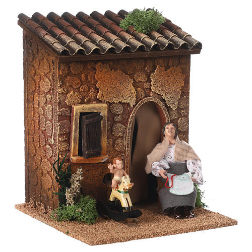 Kobieta przędząca, dziecko na koniu bujanym, ruchome figury 10 cm, 20x15x15 cm 3