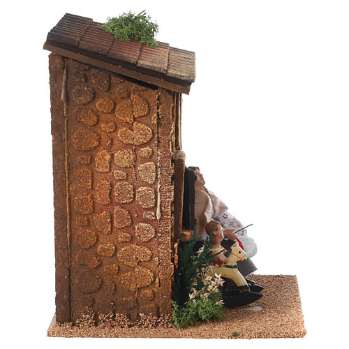 Kobieta przędząca, dziecko na koniu bujanym, ruchome figury 10 cm, 20x15x15 cm 4