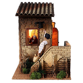 Movimento Uomo e donna alla finestra presepe 12 cm 30x20x25 cm