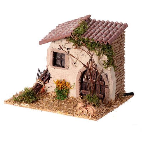 Miniature rustic house 15x20x15cm with flickering fire, 6cm nativity scene 3