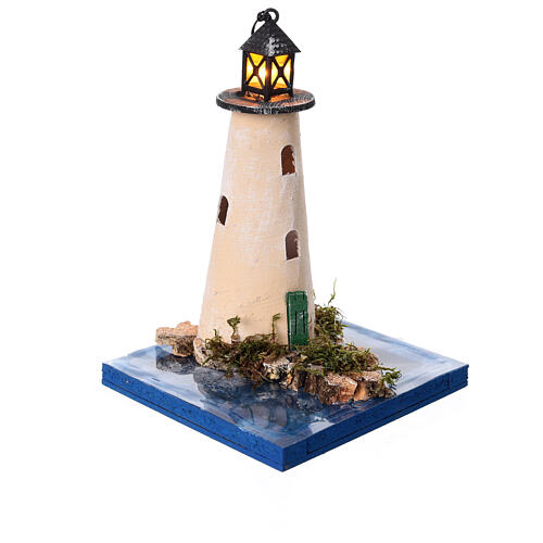 Portion de mer : phare avec lumière 3,5V boîtier piles 10x15x10 cm 3