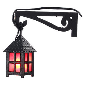 Low voltage wall lamp figurine