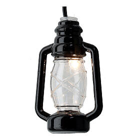 Oil lamp with low voltage plug