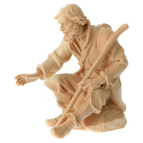 Nativity shepherd sitting with stick in Mountain Pine wood 12 cm