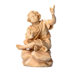 Child sitting at a bonfire in Mountain pine wood nativity 12 cm