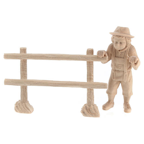 Child looking beyond a fence for 12 cm Mountain Nativity Scene, natural Swiss pinewood, set of 2 4