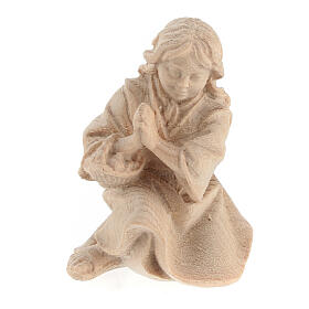 Girl praying on her knees in Mountain Pine in natural wood nativity 12 cm