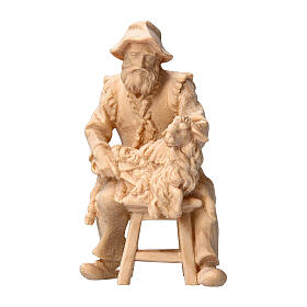 Shepherd sitting in Mountain Pine natural wood 10 cm nativity