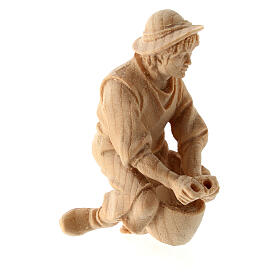 Shepherd milking with goat in Mountain Pine natural wood nativity 10 cm
