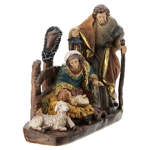 Colourful resin Nativity with seated lamb, 20x20x8 cm 3