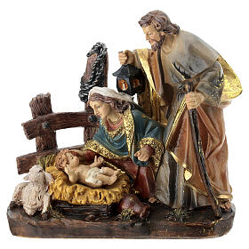 Colored resin Nativity Holy Family statue with sitting lamb, 20x20x8 cm