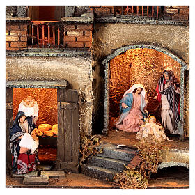 Two-storey house with Nativity and bakery 25x30x25 cm for Neapolitan Nativity Scene with 8 cm characters
