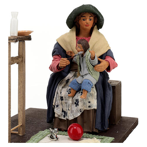 Woman feeding baby ANIMATED, Naples nativity scene 24 cm 2