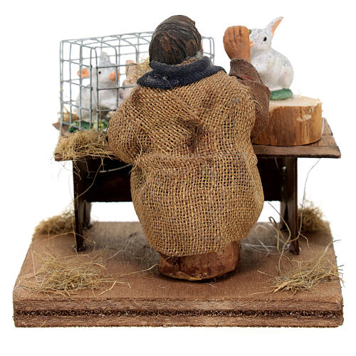 Homem alimentando coelhos para presépio napolitano com figuras de altura média 10 cm 4
