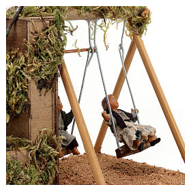 Children on swing Neapolitan nativity scene ANIMATED 12 cm