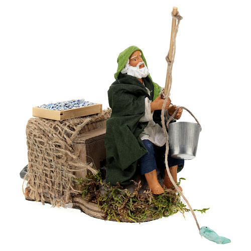 Rybak siedzący z wędką, do szopki ruchoma, figura 10 cm 4