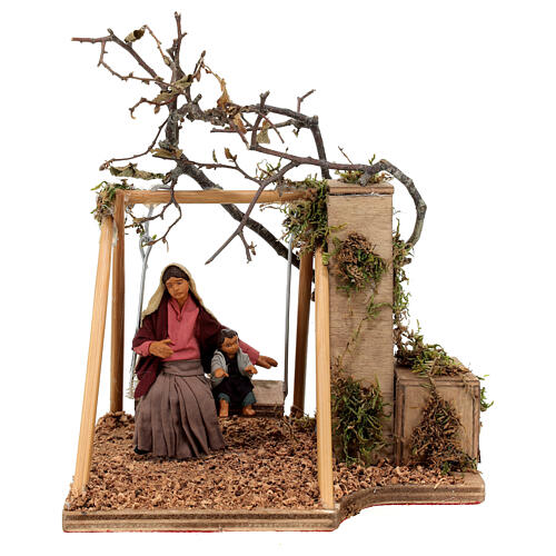 Mother on swing baby 10 cm Neapolitan nativity scene ANIMATED 1