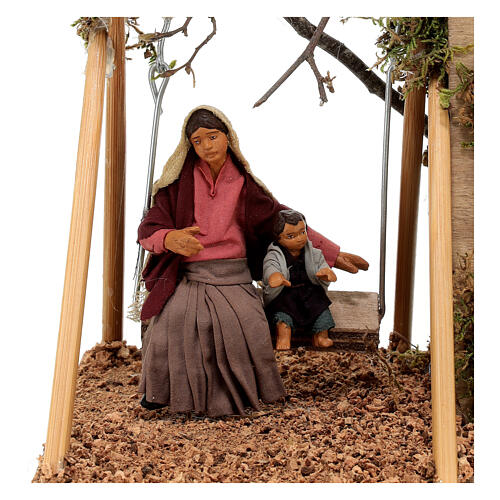 Mother on swing baby 10 cm Neapolitan nativity scene ANIMATED 2