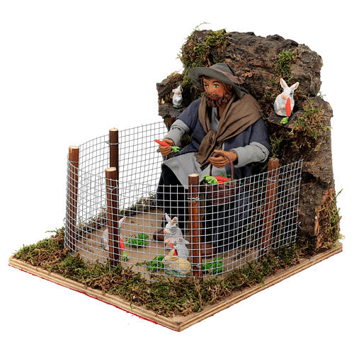 Homem alimentando coelhos no cercado MOVIMENTO para presépio napolitano com figuras altura média 24 cm 3